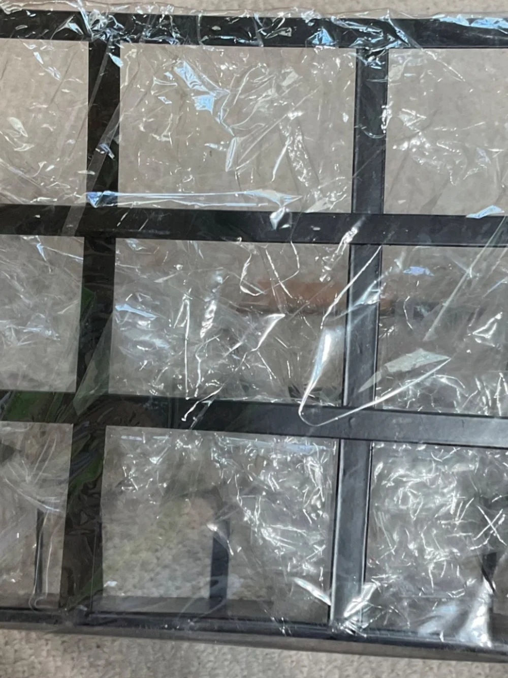 black metal grid basket